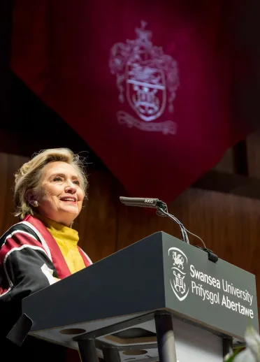 A person standing at a podium.