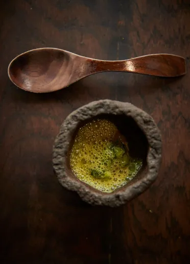 Food in a bowl with a spoon