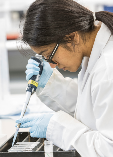 Female student in the laboratory, Swansea University
