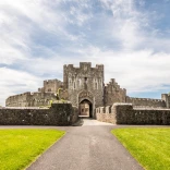 Exterior shot of the entrance to an old castle.