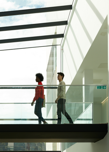 Students walking in corridor, Bangor University
