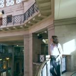 female looking up in National Museum Cardiff