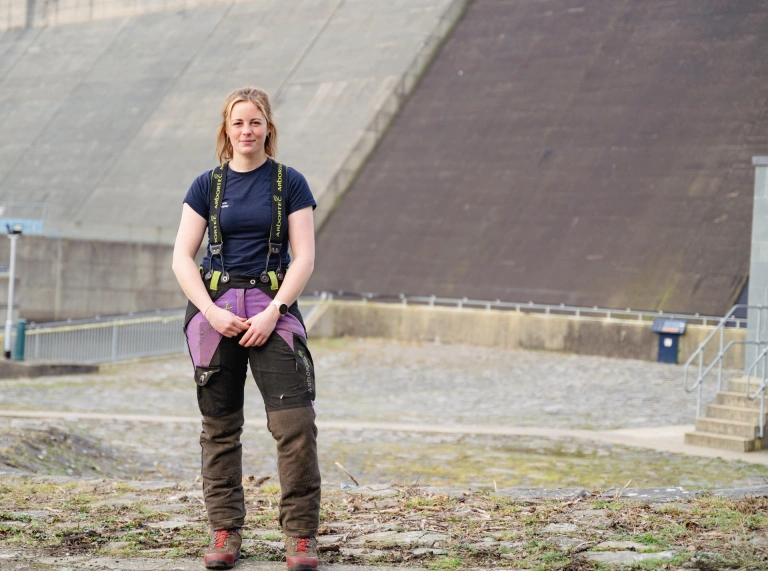 A person in work clothes.