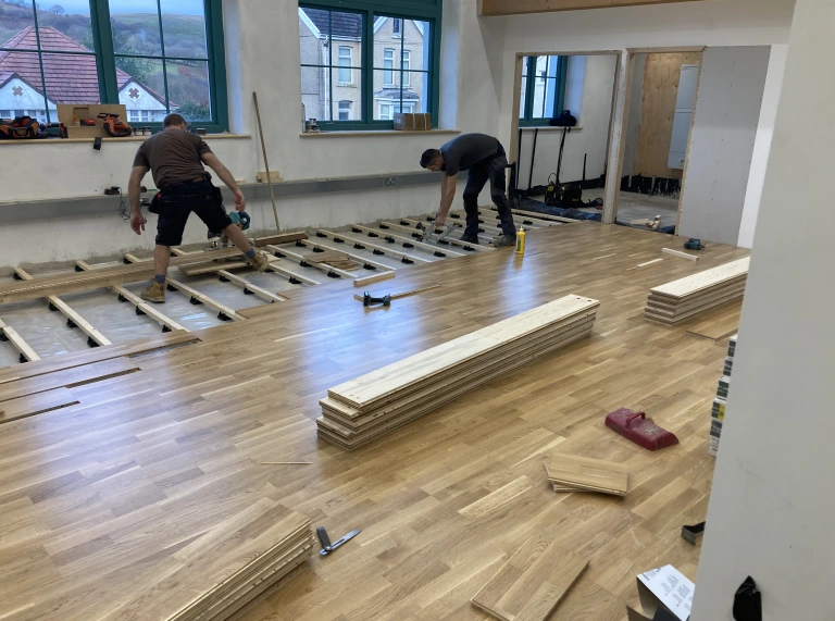 New floor at Hwb y Gors above underfloor heating supplied by ground source heat pump