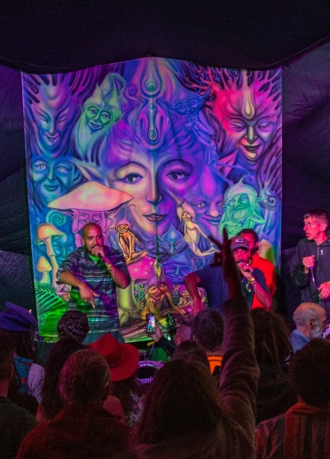 Four people performing on stage.