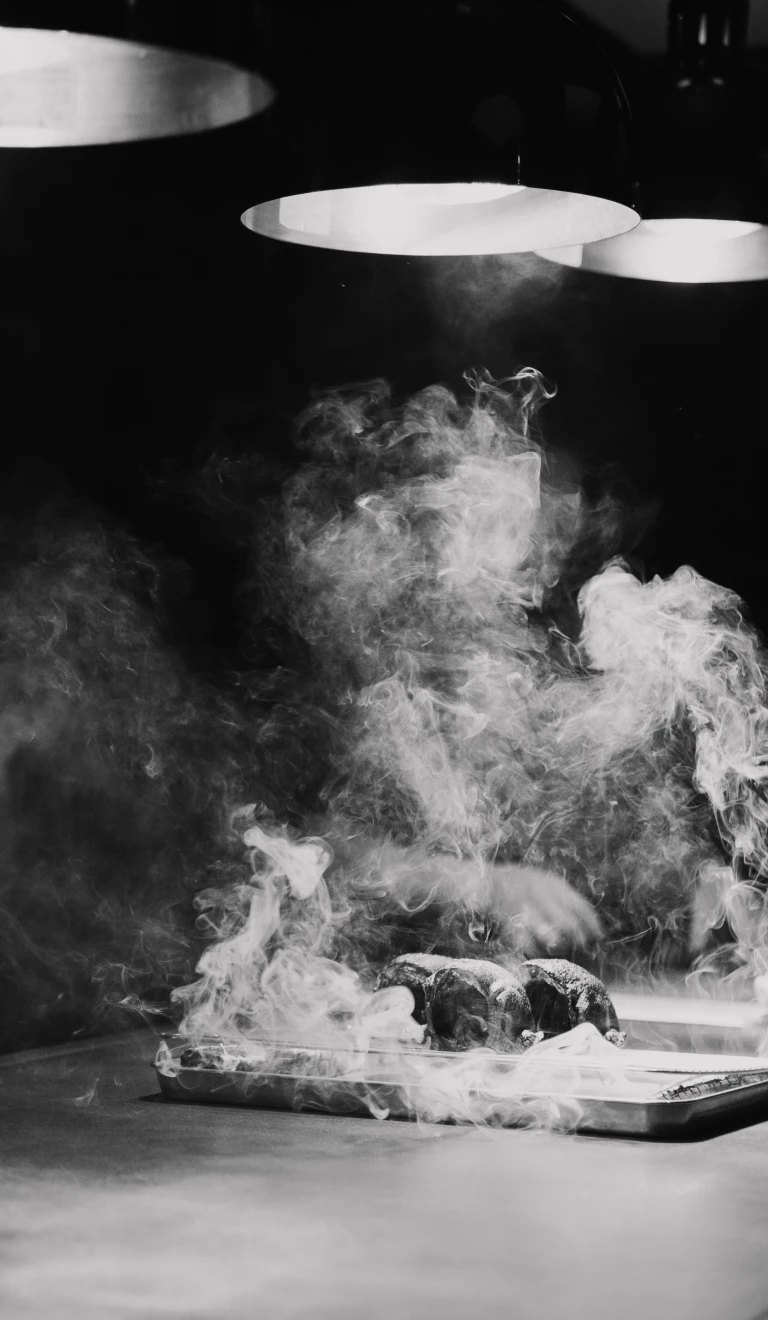 A steaming steak on a board.