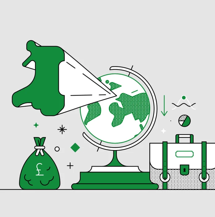 Infographic of Wales highlighted on a globe with business and economy illustrations beside it
