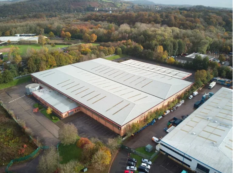 A large building surrounded by trees.
