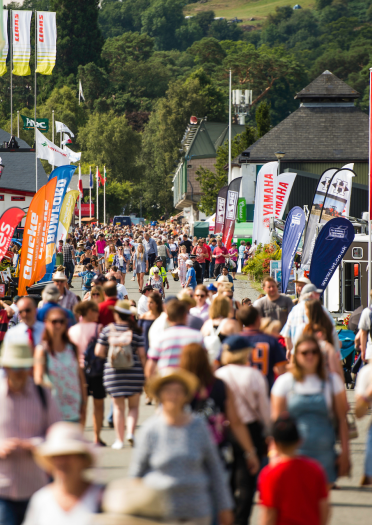 people walking with banners and flags 