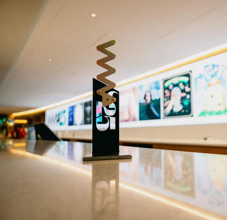 The Welsh Music Prize 2025 trophy standing in the foyer of the Wales Millennium Centre, where the awards were held