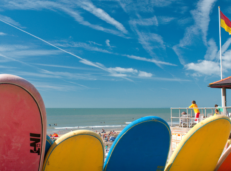Lifeguard station (with surfboards to foreground), Rest Bay, Porthcawl