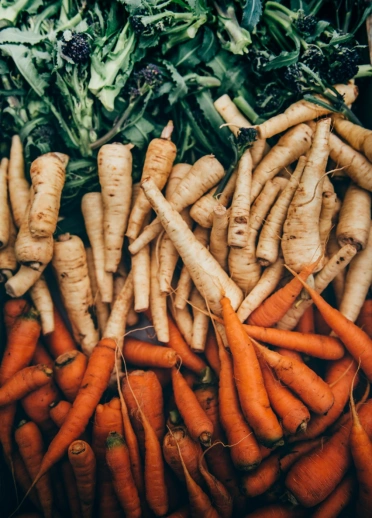 Box of parsnips and carrots.