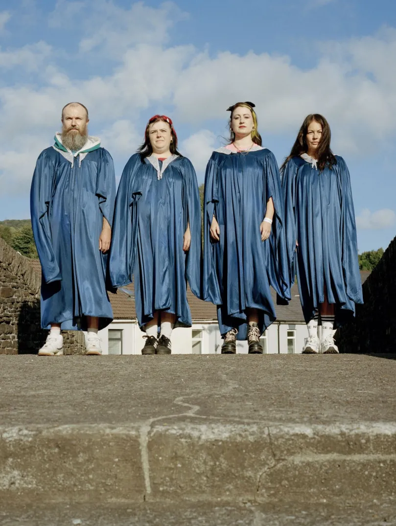 Four people from HMS Morris standing together.