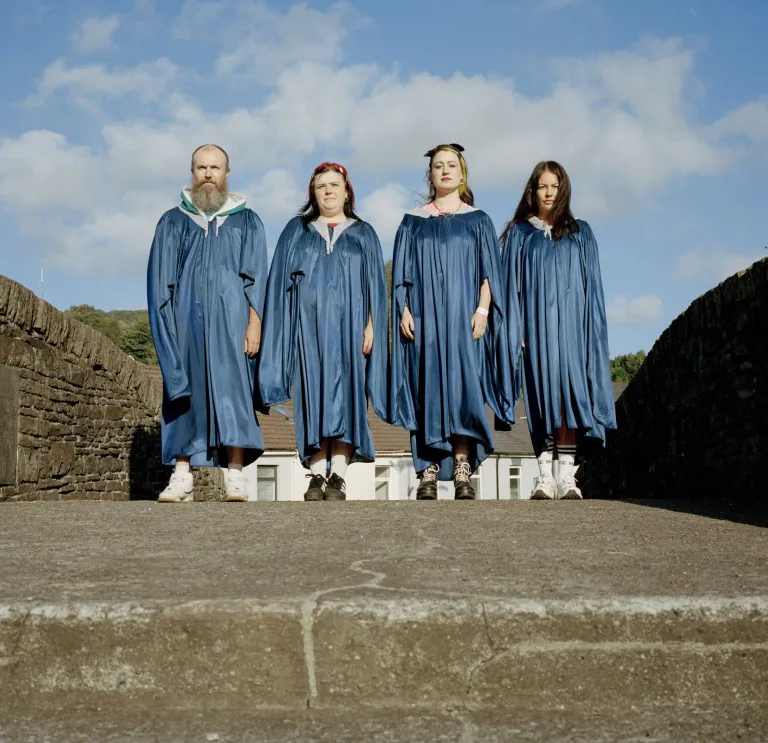 Four people from HMS Morris standing together.