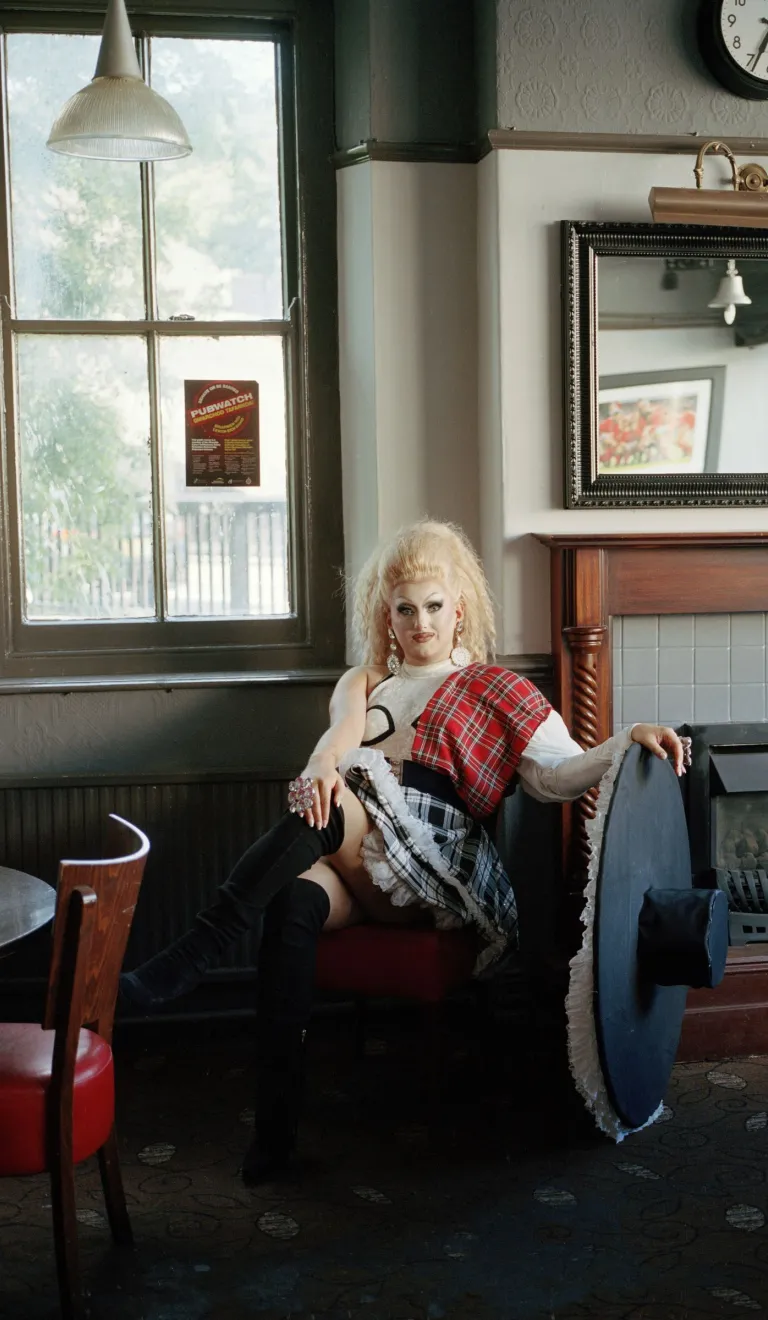 Drag queen Catrin Feelings sitting in a Welsh pub