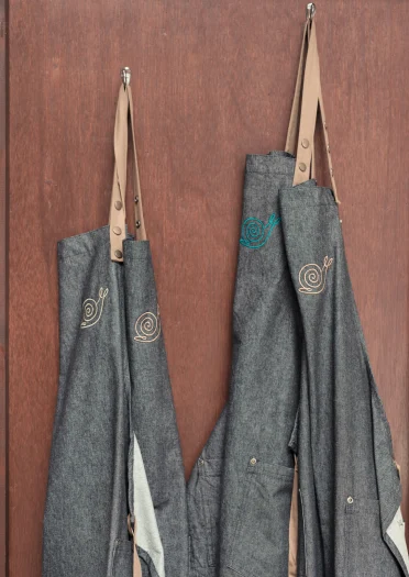 Aprons hanging in Dyfi Distillery