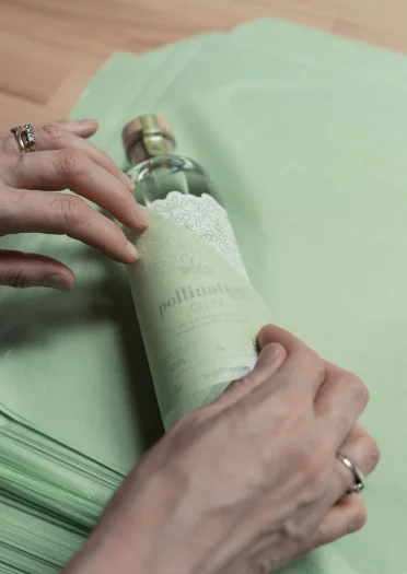 Packing gin in tissue