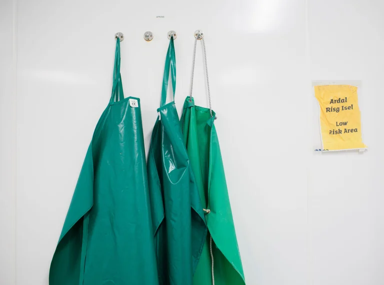 Aprons hanging in Halen Môn factory