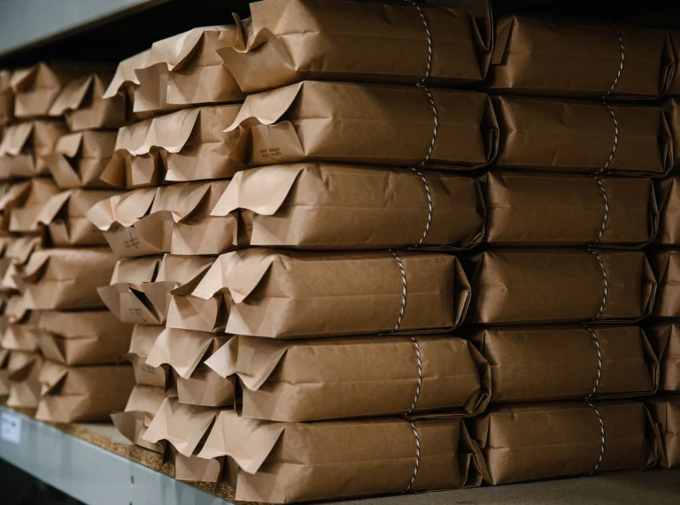 Packed coffee beans on shelf