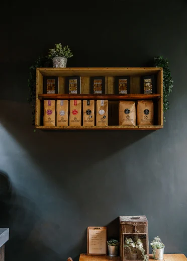 Coffee varieties displayed on shelf